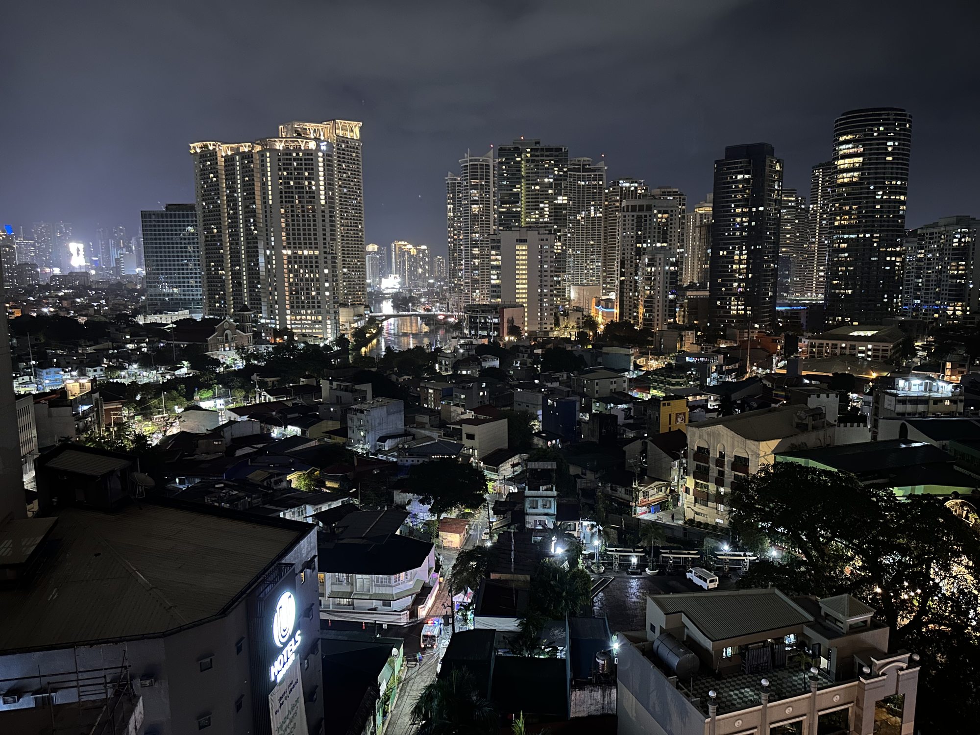 Manila city skyline at night — a city of 1.7 million contact centre professionals